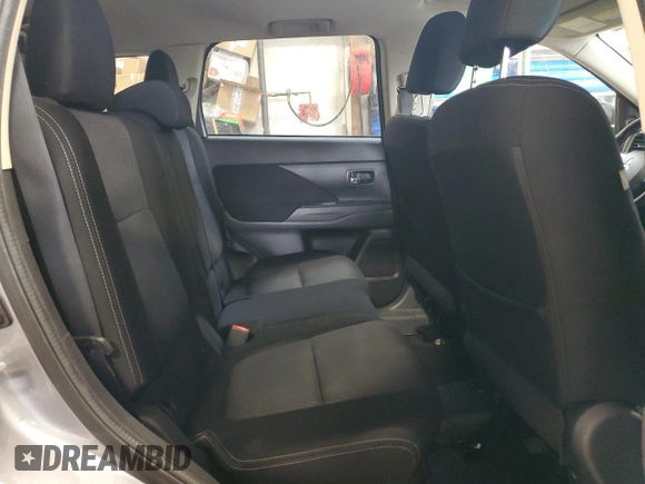 2016 Mitsubishi Outlander ES z VIN JA4AZ2A34GZ604519, wystawiony jako Copart lot #54229255 z przebiegiem 153 703 mil mil oraz Szkoda całkowita • Salvage title. Historia ofert i sprzedaży dostępna na DreamBid. Obrazek 11.