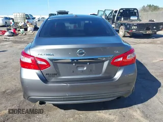 2016 Nissan Altima S z VIN 1N4AL3AP8GC139770, wystawiony jako IAAI lot #41750812 z przebiegiem 116 717 mil mil oraz . Historia ofert i sprzedaży dostępna na DreamBid. Obrazek 16.
