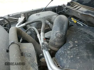 2014 Ram 1500 Tradesman z VIN 1C6RR7FTXES192585, wystawiony jako IAAI lot #42438664 z przebiegiem 156 678 mil mil oraz . Historia ofert i sprzedaży dostępna na DreamBid. Obrazek 21.