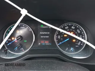 2021 Toyota RAV4 Hybrid LE z VIN 2T3MWRFV6MW118143, wystawiony jako IAAI lot #41863177 z przebiegiem 43 527 mil mil oraz . Historia ofert i sprzedaży dostępna na DreamBid. Obrazek 7.