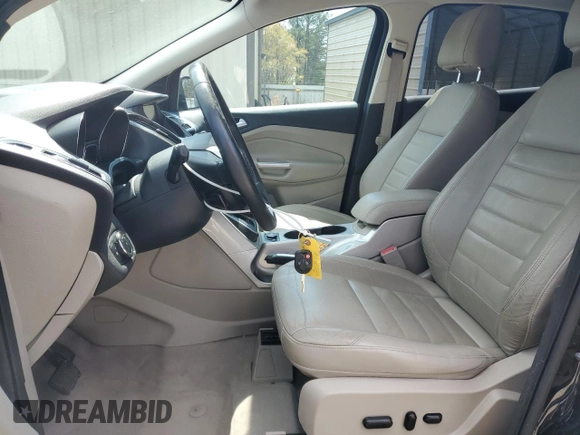 2013 Ford Escape SEL with VIN 1FMCU0HX4DUC48961, listed as a Copart auction lot 52630795 with 179,786 mi miles and Salvage Title. Bid and sale history available at DreamBid. Image 7.
