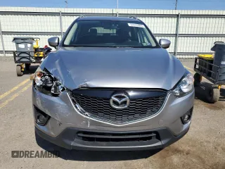 2014 Mazda CX-5 Grand Touring with VIN JM3KE4DY4E0305212, listed as a Copart auction lot 53145305 with 233,061 mi miles and Salvage Title. Bid and sale history available at carsss.com. Image 5.