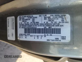 2000 Mercury Villager z VIN 4M2XV14T0YDJ07610, wystawiony jako Copart lot #79814194 z przebiegiem 132 833 mil mil oraz Szkody całkowita. Historia ofert i sprzedaży dostępna na DreamBid. Obrazek 13.