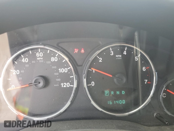 2010 Jeep Liberty Sport with VIN 1J4PN2GK8AW100147, listed as a Copart auction lot 63013305 with 161,400 mi miles and Salvage title. Bid and sale history available at DreamBid. Image 9.