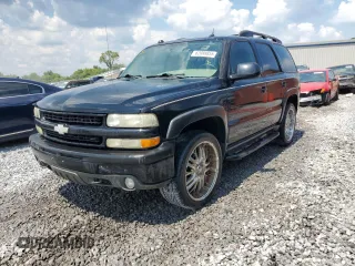 2005 Chevrolet Tahoe Z71 with VIN 1GNEC13T85R200692, listed as a Copart auction lot 62088855 with 242,402 mi miles and Salvage title. Bid and sale history available at DreamBid. Image 1.