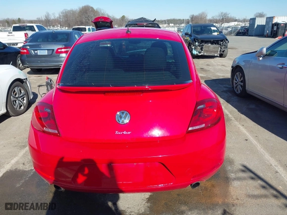 2012 Volkswagen Beetle 2.0T Turbo w/Sun/Sound with VIN 3VWV67ATXCM650376, listed as a IAAI auction lot 41315431 with 104,523 mi miles. Bid and sale history available at carsss.com. Image 16.