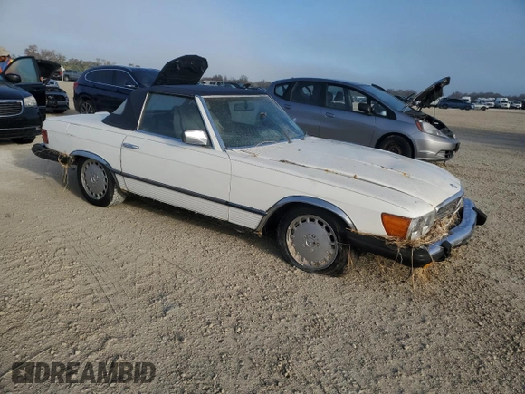 1980 Mercedes-Benz SL with VIN 10704412062529, listed as a Copart auction lot 77941784 with Not provided miles and Salvage title. Bid and sale history available at DreamBid. Image 4.