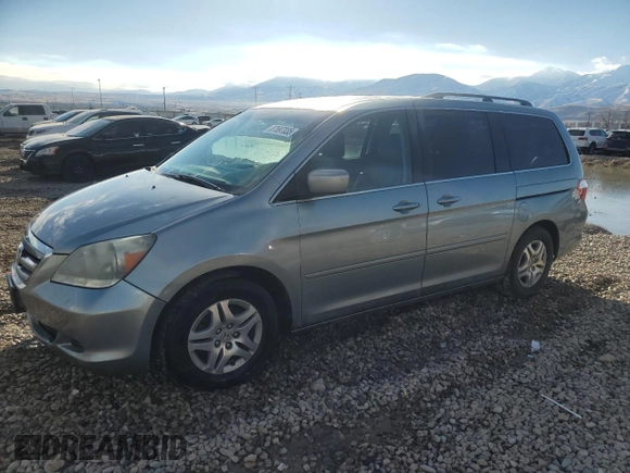 2007 Honda Odyssey EX-L with VIN 5FNRL38647B023186, listed as a Copart auction lot 87697035 with 190,884 mi miles and Salvage Title. Bid and sale history available at carsss.com. Image 1.