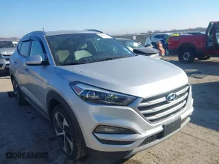2017 Hyundai Tucson Value with VIN KM8J33A22HU457809, listed as a IAAI auction lot 41632652 with 26,154 mi miles. Bid and sale history available at carsss.com. Image 1.
