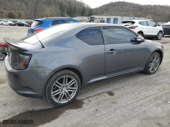 2011 Scion tC with VIN JTKJF5C71B3017022, listed as a Copart auction lot 52859865 with 220,603 mi miles and Salvage Title. Bid and sale history available at carsss.com. Image 3.