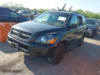 2004 Honda Pilot EX with VIN 2HKYF18614H535377, listed as a IAAI auction lot 42099729 with 362,460 mi miles. Bid and sale history available at carsss.com. Image 6.