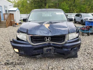 2012 Honda Ridgeline RT with VIN 5FPYK1F27CB454710, listed as a Copart auction lot 57634595 with 168,131 mi miles and Salvage title. Bid and sale history available at DreamBid. Image 5.