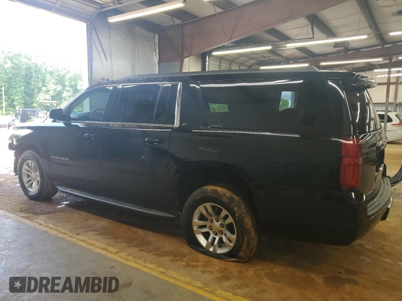 2015 Chevrolet Suburban LT z VIN 1GNSKJKC2FR744694, wystawiony jako Copart lot #56769735 z przebiegiem 125 944 mil mil oraz Szkoda całkowita • Salvage title. Historia ofert i sprzedaży dostępna na DreamBid. Obrazek 2.