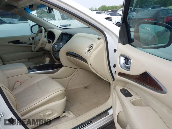 2013 Infiniti JX35 with VIN 5N1AL0MN0DC336166, listed as a IAAI auction lot 41921008 with 210,268 mi miles and . Bid and sale history available at DreamBid. Image 5.