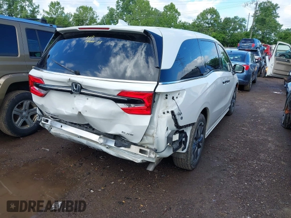 2022 Honda Odyssey Elite with VIN 5FNRL6H91NB058941, listed as a IAAI auction lot 42320293 with 30,977 mi miles and . Bid and sale history available at DreamBid. Image 4.