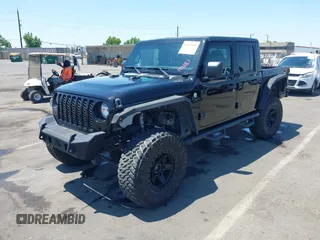 2020 Jeep Gladiator Sport S with VIN 1C6HJTAGXLL123540, listed as a IAAI auction lot 42453999 with 27,855 mi miles and . Bid and sale history available at DreamBid. Image 18.