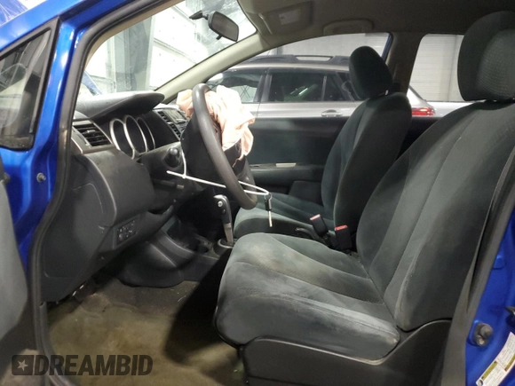 2010 Nissan Versa 1.8 SL with VIN 3N1BC1CP8AL396457, listed as a Copart auction lot 86810794 with 144,859 mi miles and Salvage Title. Bid and sale history available at carsss.com. Image 7.