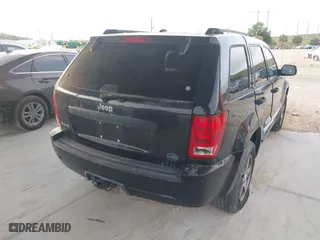 2005 Jeep Grand Cherokee Laredo with VIN 1J4HR48N75C647740, listed as a IAAI auction lot 41803160 with 145,147 mi miles. Bid and sale history available at carsss.com. Image 4.