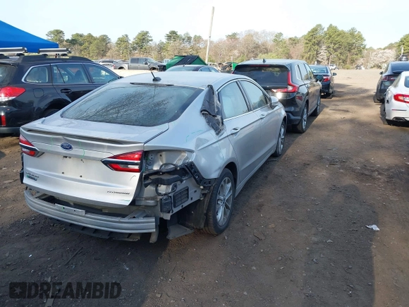 2019 Ford Fusion Titanium with VIN 3FA6P0SU8KR212370, listed as a IAAI auction lot 42114934 with 42,521 mi miles and . Bid and sale history available at DreamBid. Image 4.