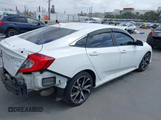 2019 Honda Civic Si z VIN 2HGFC1E58KH707715, wystawiony jako IAAI lot #42108131 z przebiegiem 126 044 mil mil oraz . Historia ofert i sprzedaży dostępna na DreamBid. Obrazek 4.