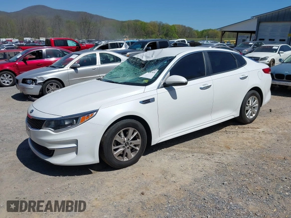 2016 Kia Optima LX z VIN 5XXGT4L3XGG080662, wystawiony jako IAAI lot #42048361 z przebiegiem 99 564 mil mil oraz . Historia ofert i sprzedaży dostępna na DreamBid. Obrazek 2.