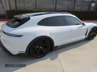 2022 Porsche Taycan 4 z VIN WP0BA2Y19NSA67581, wystawiony jako Copart lot #59634035 z przebiegiem 6 775 mil mil oraz Szkoda całkowita • Salvage title. Historia ofert i sprzedaży dostępna na DreamBid. Obrazek 3.