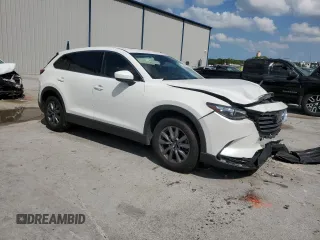2023 Mazda CX-9 Touring z VIN JM3TCBCY6P0647537, wystawiony jako Copart lot #51578145 z przebiegiem 51 316 mil mil oraz Nie do naprawy • Non repairable. Historia ofert i sprzedaży dostępna na DreamBid. Obrazek 4.