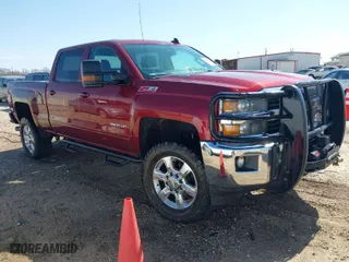 2015 Chevrolet Silverado 2500HD LT with VIN 1GC1KVE8XFF571575, listed as a IAAI auction lot 41742239 with 302,495 mi miles. Bid and sale history available at carsss.com. Image 1.