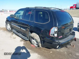2004 GMC Envoy SLE z VIN 1GKDT13SX42416096, wystawiony jako IAAI lot #41695510 z przebiegiem 240 658 mil mil oraz . Historia ofert i sprzedaży dostępna na DreamBid. Obrazek 3.