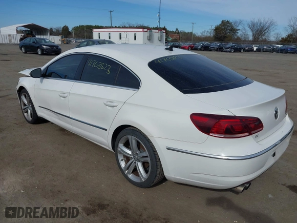 2013 Volkswagen CC Sport with VIN WVWBP7AN2DE546296, listed as a IAAI auction lot 41763823 with 102,028 mi miles. Bid and sale history available at carsss.com. Image 3.