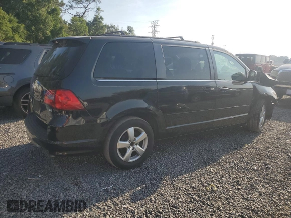 2011 Volkswagen Routan SE с VIN 2V4RW3DG8BR622116, выставлен на аукционе Copart как лот 58756365 с пробегом 153 945 миль миль и Списание • Salvage title. История ставок и продаж доступна на DreamBid. Изображение 3.