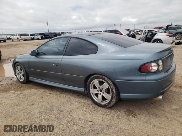 2006 Pontiac GTO z VIN 6G2VX12U06L550451, wystawiony jako Copart lot #54823105 z przebiegiem 273 049 mil mil oraz Tytuł czysty. Historia ofert i sprzedaży dostępna na DreamBid. Obrazek 2.