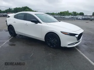 2021 Mazda 3 Premium Plus z VIN JM1BPBEY3M1316457, wystawiony jako IAAI lot #42333649 z przebiegiem 57 337 mil mil oraz . Historia ofert i sprzedaży dostępna na DreamBid. Obrazek 1.