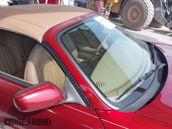 1997 Jaguar XK with VIN SAJGX274XVC004952, listed as a IAAI auction lot 42211023 with 109,889 mi miles and . Bid and sale history available at DreamBid. Image 12.