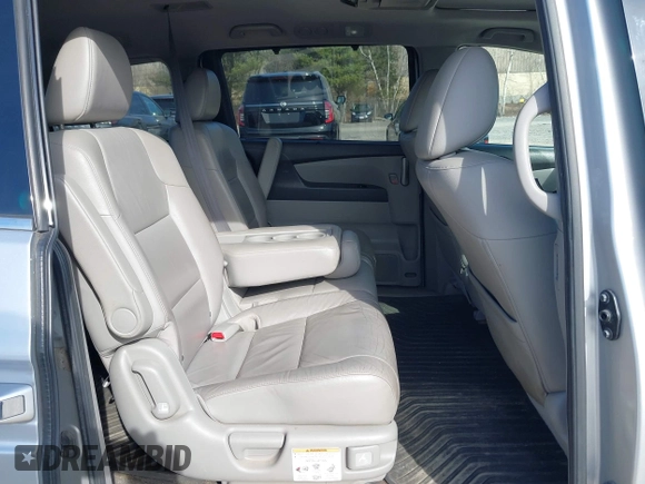 2012 Honda Odyssey Touring with VIN 5FNRL5H95CB063003, listed as a IAAI auction lot 41871975 with 179,332 mi miles and . Bid and sale history available at DreamBid. Image 8.