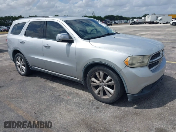 2011 Dodge Durango Crew with VIN 1D4RD4GGXBC598205, listed as a IAAI auction lot 41908965 with 182,875 mi miles and . Bid and sale history available at carsss.com. Image 1.