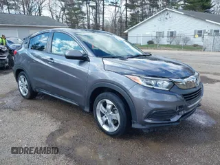 2019 Honda HR-V LX with VIN 3CZRU6H30KG718301, listed as a IAAI auction lot 41882469 with 75,686 mi miles. Bid and sale history available at carsss.com. Image 1.