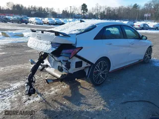 2023 Hyundai Elantra N with VIN KMHLW4AK6PU011540, listed as a IAAI auction lot 41362380 with 18,538 mi miles. Bid and sale history available at carsss.com. Image 4.