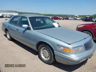 1995 Mercury Grand Marquis LS z VIN 2MELM75W1SX612122, wystawiony jako IAAI lot #42254444 z przebiegiem 94 332 mil mil oraz . Historia ofert i sprzedaży dostępna na DreamBid. Obrazek 1.