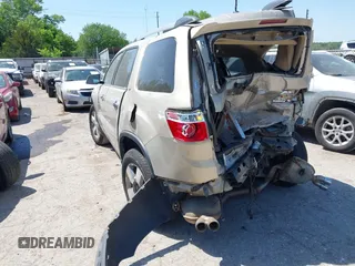 2010 GMC Acadia SLT1 with VIN 1GKLRMEDXAJ195059, listed as a IAAI auction lot 42255816 with Not provided miles and . Bid and sale history available at DreamBid. Image 3.