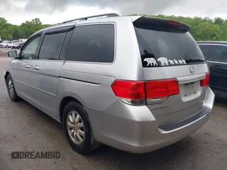 2010 Honda Odyssey EX with VIN 5FNRL3H48AB017784, listed as a IAAI auction lot 42096852 with 126,138 mi miles. Bid and sale history available at carsss.com. Image 3.