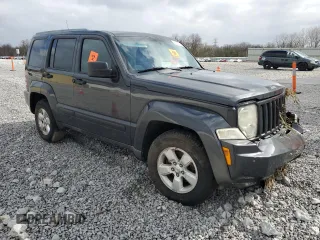 2011 Jeep Liberty Sport with VIN 1J4PN2GK1BW565094, listed as a Copart auction lot 52361215 with 154,027 mi miles and Salvage Title. Bid and sale history available at carsss.com. Image 4.