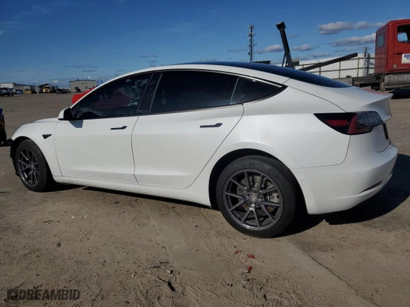 2021 Tesla Model 3 Standard Range Plus with VIN 5YJ3E1EA8MF074974, listed as a Copart auction lot 49626135 with 60,778 mi miles and Salvage Title. Bid and sale history available at carsss.com. Image 2.
