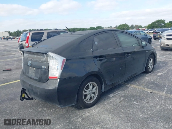 2011 Toyota Prius I with VIN JTDKN3DU4B1463121, listed as a IAAI auction lot 42057548 with 242,575 mi miles. Bid and sale history available at carsss.com. Image 4.
