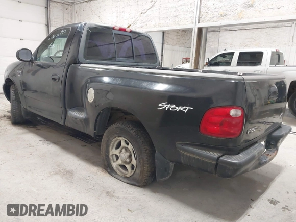 2001 Ford F-150 with VIN 2FTRF07W01CA32084, listed as a IAAI auction lot 42283557 with Not provided miles and . Bid and sale history available at DreamBid. Image 3.