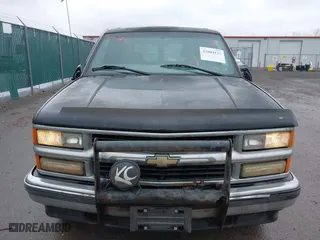 1999 Chevrolet Tahoe Z71 with VIN 1GNEK13R9XJ515820, listed as a IAAI auction lot 42004125 with 251,184 mi miles. Bid and sale history available at carsss.com. Image 6.