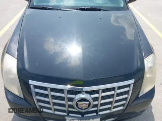 2013 Cadillac CTS Luxury with VIN 1G6DE5E50D0101763, listed as a IAAI auction lot 42090577 with 105,097 mi miles and . Bid and sale history available at DreamBid. Image 13.