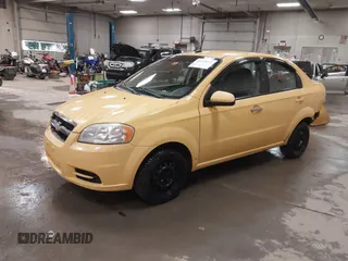 2010 Chevrolet Aveo 1LT z VIN KL1TD5DE2AB101431, wystawiony jako IAAI lot #41138812 z przebiegiem 131 346 mil mil oraz . Historia ofert i sprzedaży dostępna na DreamBid. Obrazek 2.