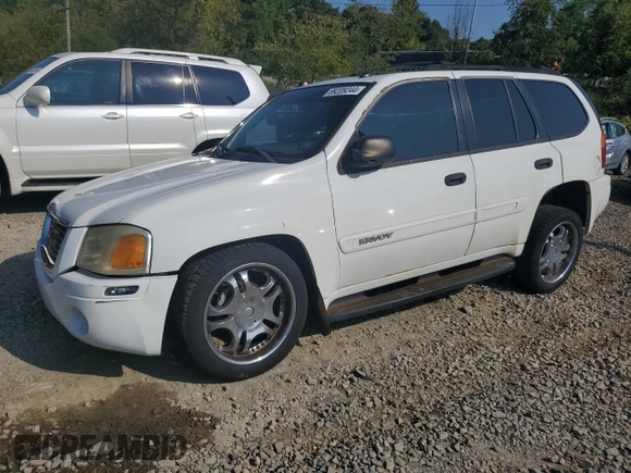 2005 GMC Envoy SLT with VIN 1GKDT13S552329269, listed as a Copart auction lot 69209244 with 154,595 mi miles and Salvage Title. Bid and sale history available at carsss.com. Image 1.