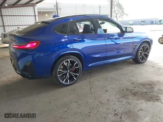 2022 BMW X4 M with VIN 5YM23EC05N9J74682, listed as a IAAI auction lot 41420906 with 46,314 mi miles. Bid and sale history available at carsss.com. Image 4.